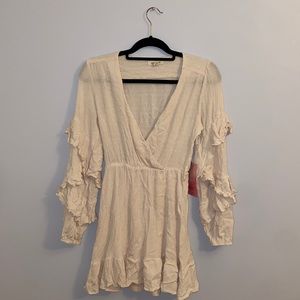 Cream Polka Dot Dress with Ruffle Sleeves!